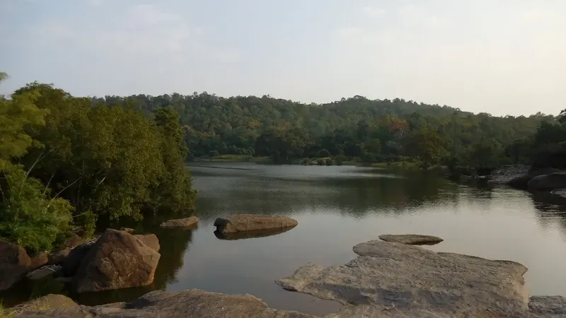 Denwa River with rocks and forested banks in Satpura