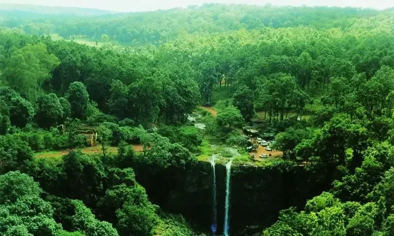 Waterfall in a forested valley near Pachmarhi