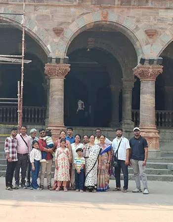 Guest family under palace arches