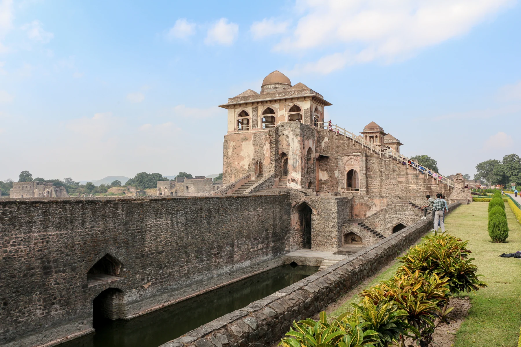 Jahaz Mahal in Mandu, its long original palace facade and lakeside setting