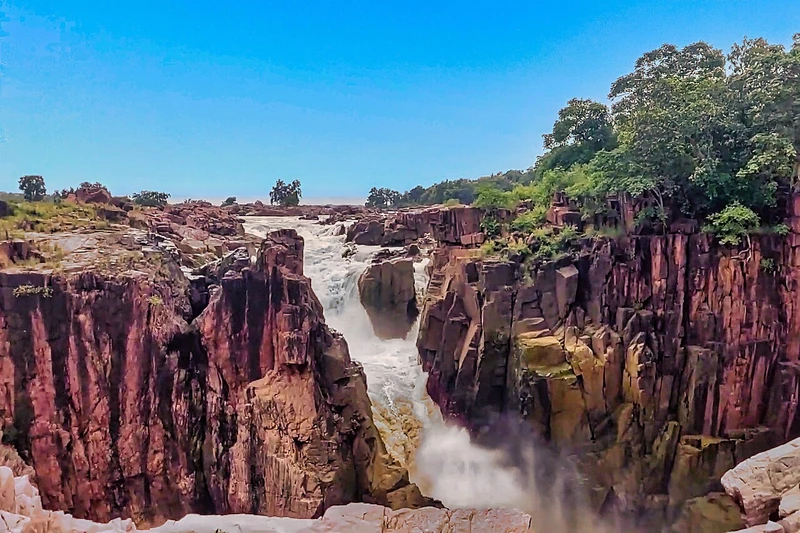 The coloured rock canyon and waterfalls at Raneh Falls
